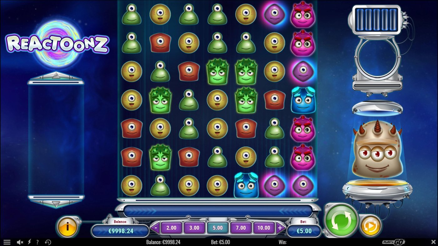 Reactoonz gameplay: a 7×7 grid full of colourful aliens and the Quantumeter